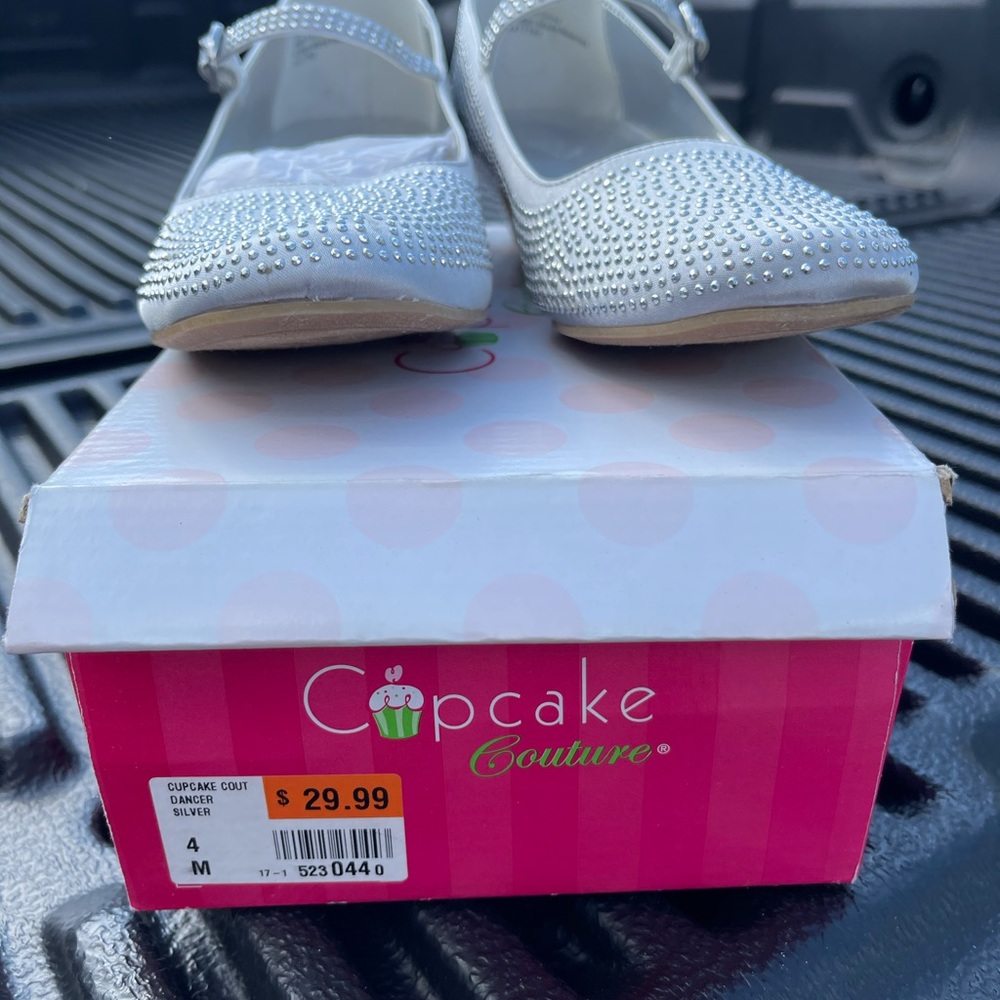 Brand new in box, dressy silver studded shoes.